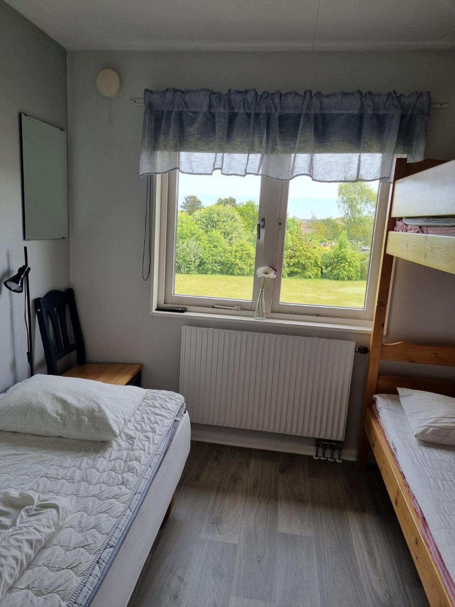 Dreibettzimmer mit Gemeinschaftsbad