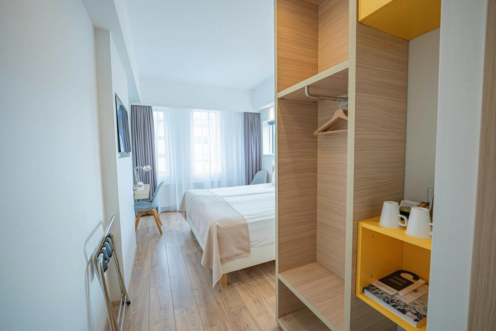 Doppel- oder Zweibettzimmer