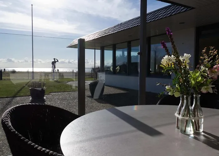 Haustierfreundliches Hotel: Inselblume 82 - Bungalow am Südstrand mit Meerblick